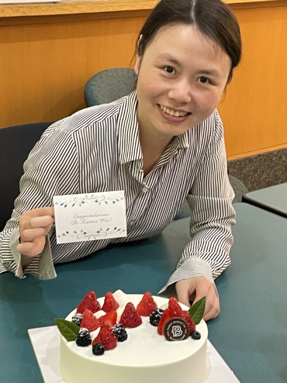 Xuemei with graduation cake
